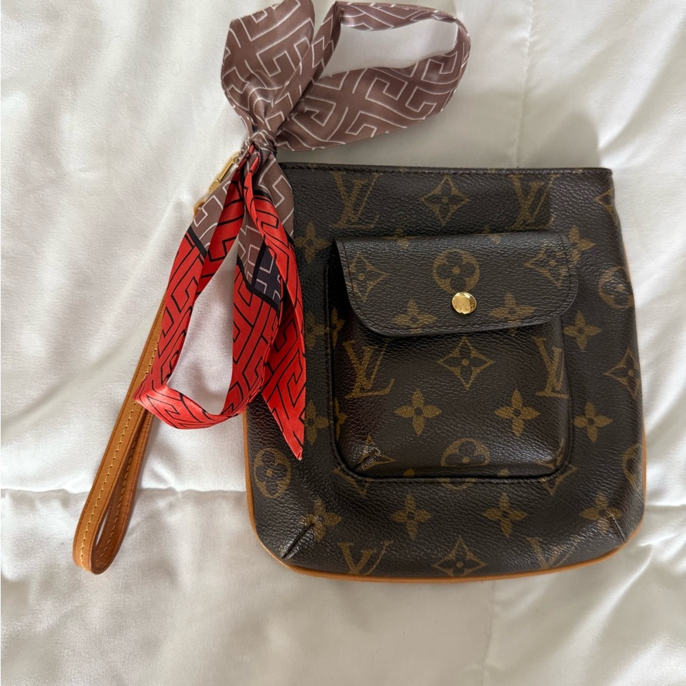 Discontinued Louis Vuitton Monogram Wristlet